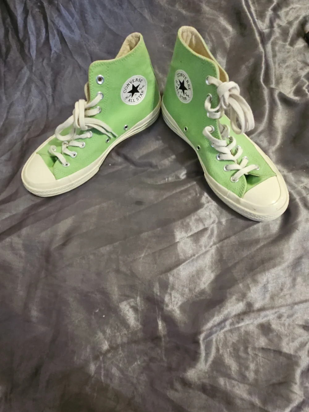 Converse high-top sneakers in mint green and white
